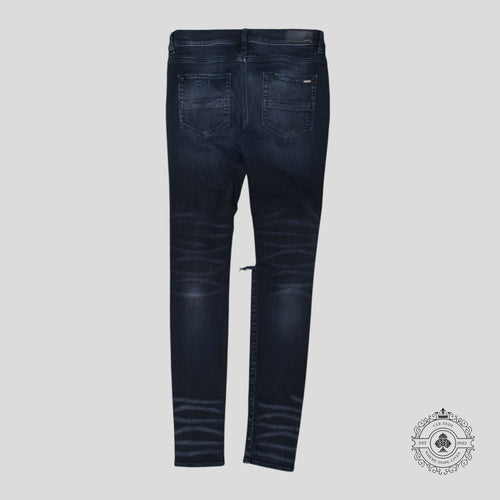 Amiri MX1 Thrashed Denim in Aged Black